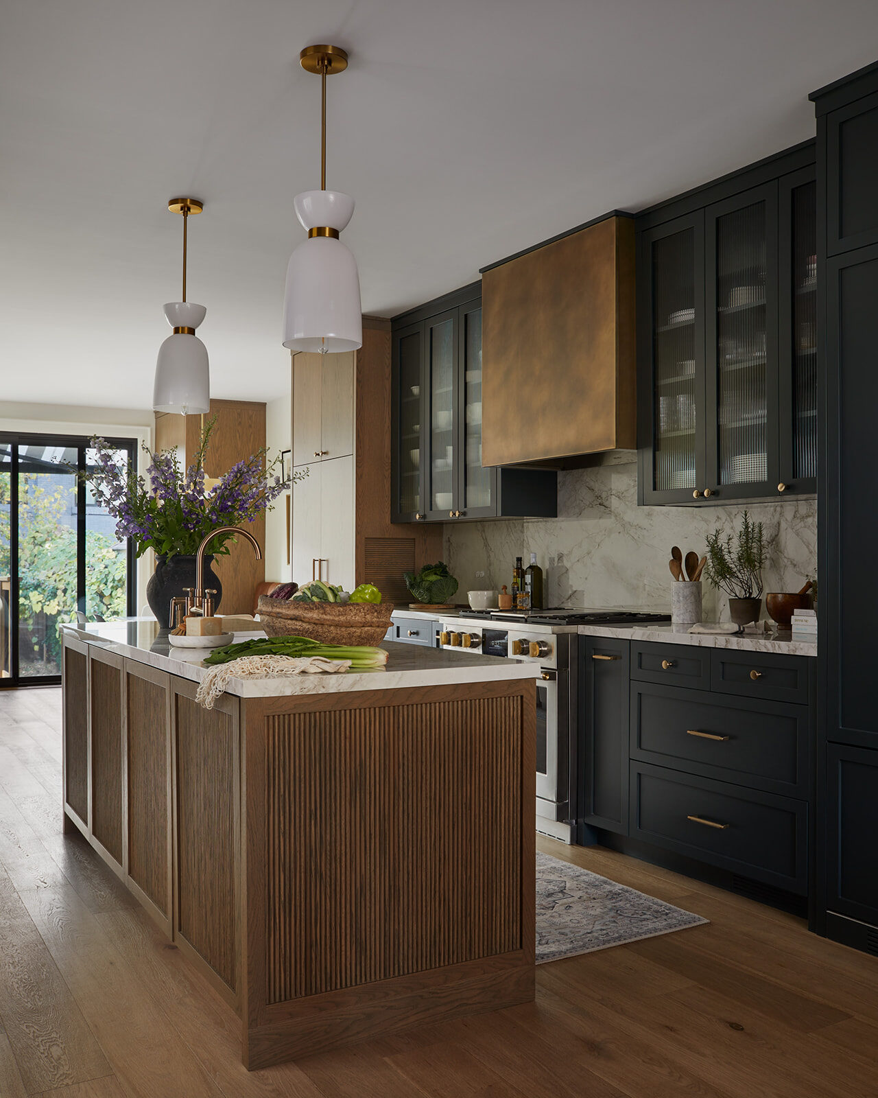 Custom kitchen with dark cabinetry